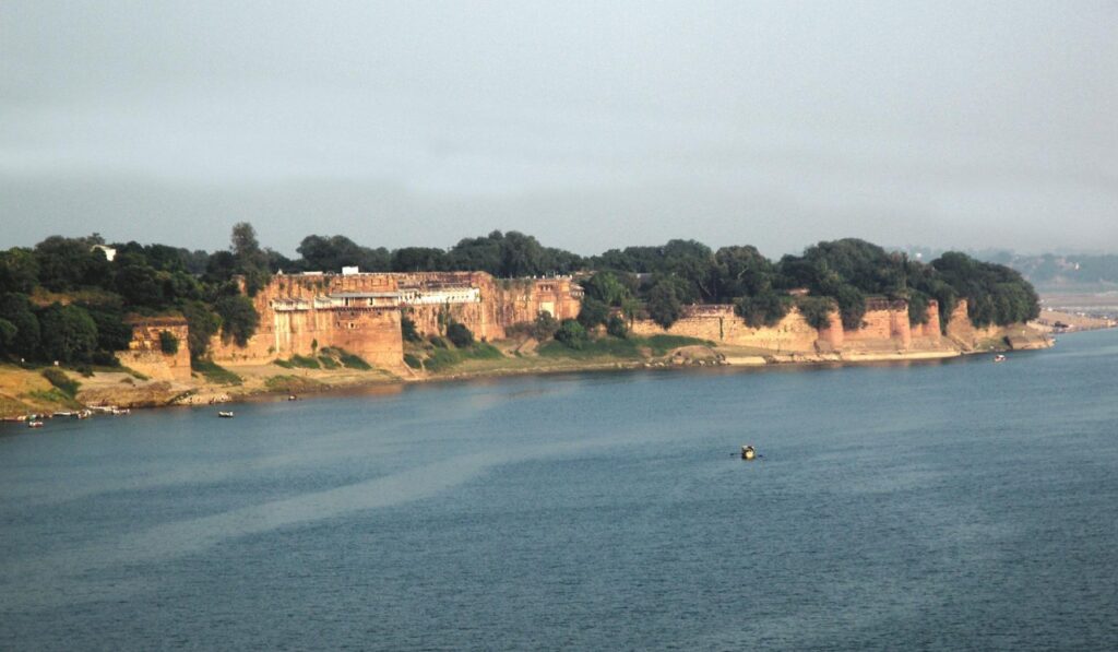 Majestic view of Prayagraj Allahabad Fort overlooking the river, a highlight of historical Prayagraj travel from Delhi.